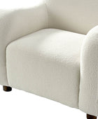 Heinrich Boucle Upholstered Armchair with Solid Wood Legs